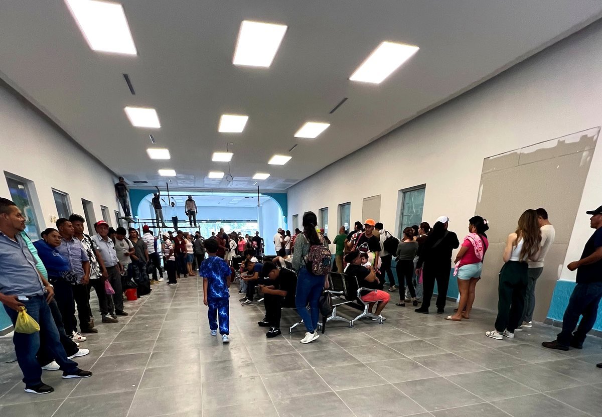A crowded border processing hall in Honduras